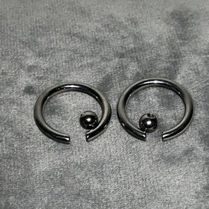 3/4 8g hoop and ball ear stretching piercings